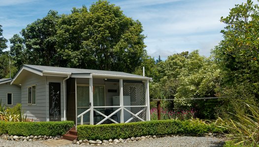 Relax outside your chalet after a day exploring the Nelson Tasman regions.