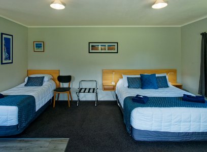 Queen and single bed in your Marahau chalet